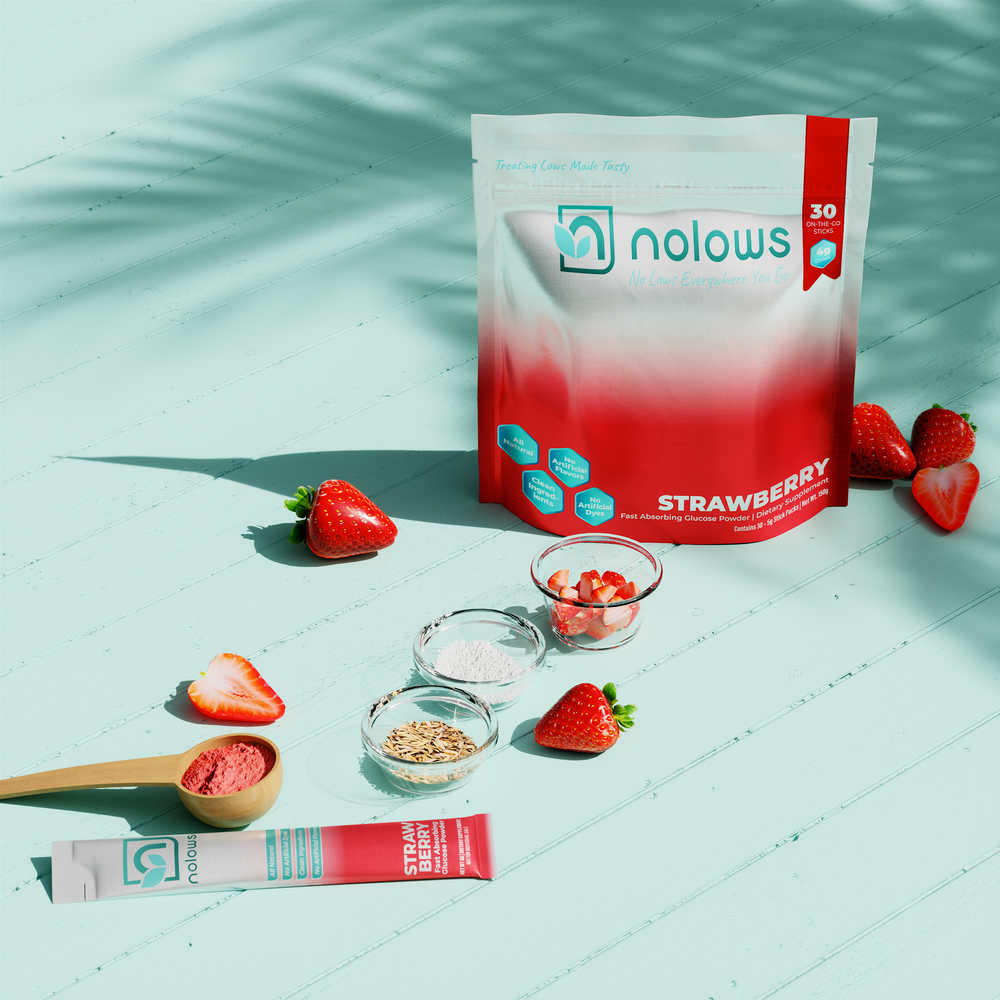 Nolows Fast Absorbing Strawberry Glucose Powder 30 Count Pouch And Stick Pack powder on white floor with palm frond shadow and clean ingredients